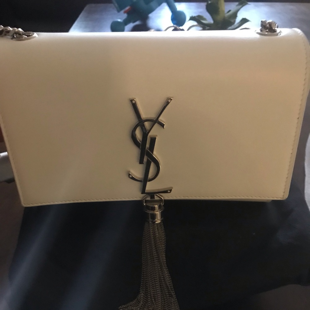 Brand new YSL clutch style